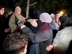 Family members welcome released Palestinian prisoner Fatima Amarneh, amid a hostages-prisoners swap deal between Hamas and Israel, near Jenin in the Israeli-occupied West Bank. (Reuters)
