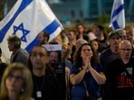 People participate in a show of solidarity with hostages being held in the Gaza Strip. People participate in a show of solidarity with hostages being held in the Gaza Strip.