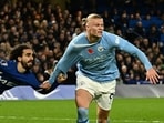 FILE PHOTO: Chelsea's Marc Cucurella fouls Manchester City's Erling Braut Haaland (R)