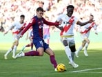 FC Barcelona's Andreas Christensen in action with Rayo Vallecano's Abdul Mumin