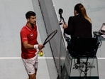Novak Djokovic reacts towards the umpire during his match against Jannik Sinner
