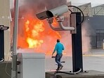 FILE PHOTO: A vehicle burns at the Rainbow Bridge U.S. border crossing with Canada, in Niagara Falls, New York, U.S. November 22, 2023 in a still image from video.  Courtesy Saleman Alwishah via REUTERS 