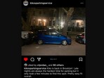 The image shows a blue car parked in front of a house. The image shows a blue car parked in front of a house.