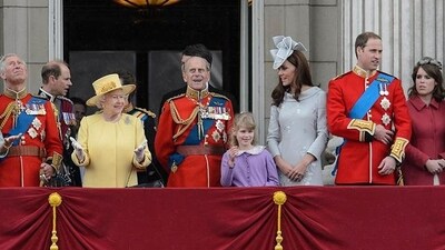 Queen Elizabeth II gestures as she stands with other members of the Royal Family on Buckingham Palace balcony following the Queen's Birthday Parade, 'Trooping the Colour' at Horse Guards Parade in London. The ceremony of Trooping the Colour is believed to have first been performed during the reign of King Charles II. In 1748, it was decided that the parade would be used to mark the official birthday of the Sovereign. AFP/Leon Neal Queen Elizabeth II gestures as she stands with other members of the Royal Family on Buckingham Palace balcony following the Queen's Birthday Parade, 'Trooping the Colour' at Horse Guards Parade in London. The ceremony of Trooping the Colour is believed to have first been performed during the reign of King Charles II. In 1748, it was decided that the parade would be used to mark the official birthday of the Sovereign. AFP/Leon Neal