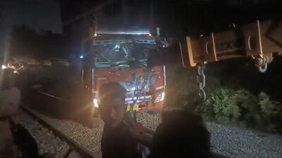 A video grab of the truck being removed from the rail track near Giaspura in Ludhiana on Friday night. (HT Photo)
