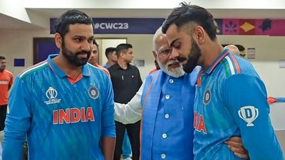 A video grab shows Prime Minister Narendra Modi consoling cricketers Rohit Sharma and Virat Kohli in their dressing room to raise their spirits after India's loss to Australia by 6 wickets in the World Cup 2023 final match at Narendra Modi Stadium in Ahmedabad (PMO ) A video grab shows Prime Minister Narendra Modi consoling cricketers Rohit Sharma and Virat Kohli in their dressing room to raise their spirits after India's loss to Australia by 6 wickets in the World Cup 2023 final match at Narendra Modi Stadium in Ahmedabad (PMO )