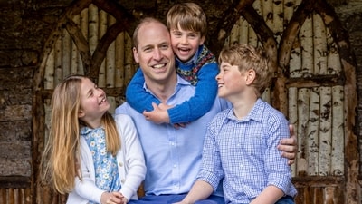 Prince William sits with his children Princess Charlotte, Prince Louis and Prince George (AP) Prince William sits with his children Princess Charlotte, Prince Louis and Prince George (AP)