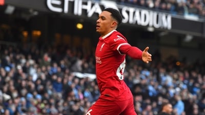 Liverpool's Trent Alexander-Arnold celebrates after scoring his side's opening goal during the English Premier League soccer match between Manchester City and Liverpool (AP) Liverpool's Trent Alexander-Arnold celebrates after scoring his side's opening goal during the English Premier League soccer match between Manchester City and Liverpool (AP)