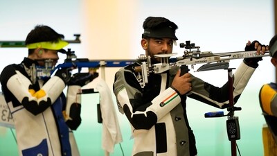 Aishwary Pratap Singh Tomar, center, takes part at the 19th Asian Games in Hangzhou, (AP) Aishwary Pratap Singh Tomar, center, takes part at the 19th Asian Games in Hangzhou, (AP)