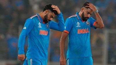 India's Virat Kohli, left, and Mohammed Siraj react after losing the ICC Men's Cricket World Cup final match against Australia. (AP) India's Virat Kohli, left, and Mohammed Siraj react after losing the ICC Men's Cricket World Cup final match against Australia. (AP)
