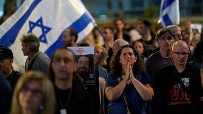 People participate in a show of solidarity with hostages being held in the Gaza Strip. (AP) People participate in a show of solidarity with hostages being held in the Gaza Strip. (AP)