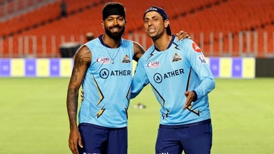 Gujarat Titans captain Hardik Pandya with team head coach Ashish Nehra (PTI/File Photo) Gujarat Titans captain Hardik Pandya with team head coach Ashish Nehra (PTI/File Photo)