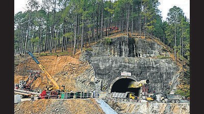 Rescue personnel work at the collapsed under construction Silkyara tunnel in the Uttarkashi district on Saturday. (AFP) Rescue personnel work at the collapsed under construction Silkyara tunnel in the Uttarkashi district on Saturday. (AFP)