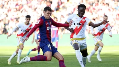 FC Barcelona's Andreas Christensen in action with Rayo Vallecano's Abdul Mumin (REUTERS)