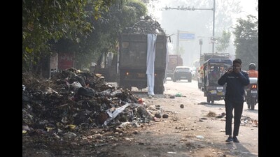 Sanitation workers are protesting for the last 45 days to press for their several demands, including job regularisation. (HT Photo) Sanitation workers are protesting for the last 45 days to press for their several demands, including job regularisation. (HT Photo)