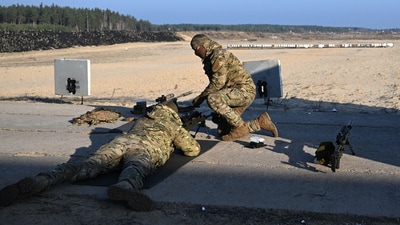 Ukrainian soldiers take part in a sniper shooting exercise at a training facility outside Kyiv, Ukraine (AFP) Ukrainian soldiers take part in a sniper shooting exercise at a training facility outside Kyiv, Ukraine (AFP)