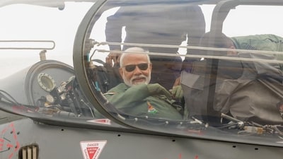 Prime Minister Narendra Modi embarked on a flight aboard the Tejas aircraft on Saturday at the Hindustan Aeronautics Limited (HAL) facility in Bengaluru, Karnataka. (NarendraModi/Twitter) Prime Minister Narendra Modi embarked on a flight aboard the Tejas aircraft on Saturday at the Hindustan Aeronautics Limited (HAL) facility in Bengaluru, Karnataka. (NarendraModi/Twitter)