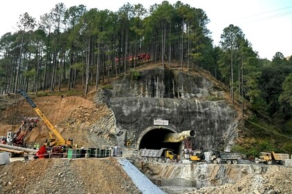 Rescue personnel work at the collapsed under construction Silkyara tunnel in the Uttarkashi district. (AFP) Rescue personnel work at the collapsed under construction Silkyara tunnel in the Uttarkashi district. (AFP)