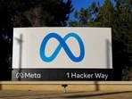 Meta's logo can be seen on a sign at the company's headquarters in Menlo Park, Calif.,