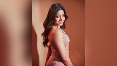 With the help of hairstylist Priyanka Borkar, Rashmika styled her lush locks into soft curls and left them open in the centre part, which cascaded beautifully down her shoulders to complete her look. (Instagram/@rashmika_mandanna) With the help of hairstylist Priyanka Borkar, Rashmika styled her lush locks into soft curls and left them open in the centre part, which cascaded beautifully down her shoulders to complete her look. (Instagram/@rashmika_mandanna)