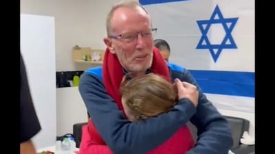 A video now viral on social media shows Emily running into the hands of her father, Thomas Hand (@AvivaKlompas/X) A video now viral on social media shows Emily running into the hands of her father, Thomas Hand (@AvivaKlompas/X)