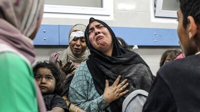 Wounded Palestinians Ahli Arab hospital at the al-Shifa hospital, (AP) Wounded Palestinians Ahli Arab hospital at the al-Shifa hospital, (AP)