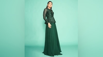 Karisma wore an emerald green ensemble for her appearance on an episode of Indian Idol. It is from the shelves of designer Sawan Gandhi's eponymous label and is a perfect sartorial pick for the wedding season. You can wear it for your best friend's Sangeet or any late-night party. Scroll through to read our download on her ethnic look. (Instagram) Karisma wore an emerald green ensemble for her appearance on an episode of Indian Idol. It is from the shelves of designer Sawan Gandhi's eponymous label and is a perfect sartorial pick for the wedding season. You can wear it for your best friend's Sangeet or any late-night party. Scroll through to read our download on her ethnic look. (Instagram)