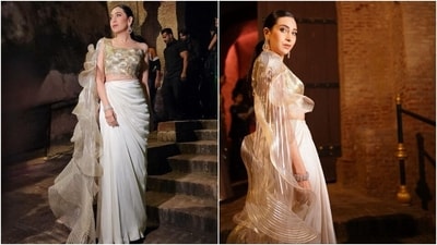 Earlier, Karisma delighted her followers with a gorgeous statement ensemble by Amit Aggarwal she wore for attending an event. "Sparkle on," she captioned the photos. The post shows her dressed in a gold-coloured cropped blouse featuring a structured sleeve extending into a train. She styled it with a silk-satin off-white skirt. (Instagram) Earlier, Karisma delighted her followers with a gorgeous statement ensemble by Amit Aggarwal she wore for attending an event. "Sparkle on," she captioned the photos. The post shows her dressed in a gold-coloured cropped blouse featuring a structured sleeve extending into a train. She styled it with a silk-satin off-white skirt. (Instagram)