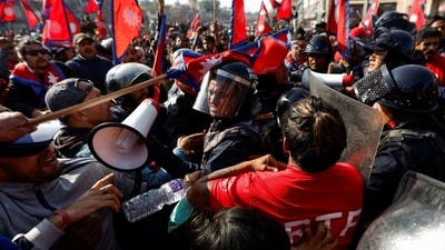 A riot police personnel gets a hit on his helmet during the clash with Pro-monarchist protesters as they protest demanding the restoration of Nepal's monarchy, which was abolished in 2008, saying the governments have failed to make any significant changes in Kathmandu, Nepal November 23, 2023. REUTERS/Navesh Chitrakar (REUTERS)