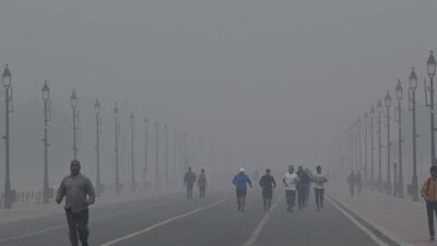 New Delhi, India - Nov. 26, 2023: Morning walkers seen during a hazy morning at Kartavya Path in New Delhi, India, on Sunday, November 26, 2023. (Photo by Arvind Yadav/ Hindustan Times) (Hindustan Times)