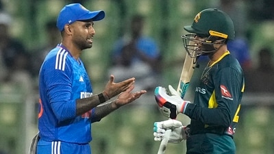 Suryakumar Yadav and Tanveer Sangha during the second T20 match between India and Australia at the Greenfield International Stadium in Thiruvananthapuram (PTI) Suryakumar Yadav and Tanveer Sangha during the second T20 match between India and Australia at the Greenfield International Stadium in Thiruvananthapuram (PTI)