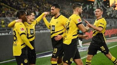 Jamie Bynoe-Gittens celebrates with his Borussia Dortmund teammates. (AFP) Jamie Bynoe-Gittens celebrates with his Borussia Dortmund teammates. (AFP)