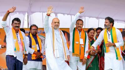 Union home minister Amit Shah with others during a public rally at Makthal ahead of Telangana assembly elections, in Narayanapet district (PTI)
