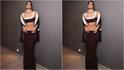 Her outfit features a square neckline, brown bralette top with white borders. She paired it with a matching maxi skirt with a bodycon fit that hugged her perfectly and accentuated her curves. A matching blazer gave the look an extra oomph. (Instagram/@jacquelienefernandez) Her outfit features a square neckline, brown bralette top with white borders. She paired it with a matching maxi skirt with a bodycon fit that hugged her perfectly and accentuated her curves. A matching blazer gave the look an extra oomph. (Instagram/@jacquelienefernandez)