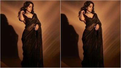 Just a day ago, Rashmika dazzled in a black netted saree, which she draped elegantly around herself, letting her pallu fall beautifully from her shoulders. Paired with a matching sweetheart neck blouse, she looked like an elegant princess. (Instagram/@rashmika_mandanna) Just a day ago, Rashmika dazzled in a black netted saree, which she draped elegantly around herself, letting her pallu fall beautifully from her shoulders. Paired with a matching sweetheart neck blouse, she looked like an elegant princess. (Instagram/@rashmika_mandanna)