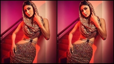 Her dazzling outfit is from the shelves of luxury fashion brand Rocky Star, while her styling was done to perfection by celebrity fashion stylist Maneka Harisinghani. (Instagram/@imouniroy) Her dazzling outfit is from the shelves of luxury fashion brand Rocky Star, while her styling was done to perfection by celebrity fashion stylist Maneka Harisinghani. (Instagram/@imouniroy)
