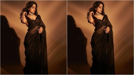 Just a day ago, Rashmika dazzled in a black netted saree, which she draped elegantly around herself, letting her pallu fall beautifully from her shoulders. Paired with a matching sweetheart neck blouse, she looked like an elegant princess.(Instagram/@rashmika_mandanna)