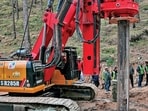 Vertical drilling machine in action at the Uttarakhand tunnel collapse site (AFP)