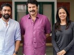 Suriya with Mammootty and Jyotika on the set of Kaathal. Suriya with Mammootty and Jyotika on the set of Kaathal.