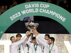 Italy's Lorenzo Musetti, Jannik Sinner, Matteo Arnaldi, Lorenzo Sonego, Simone Bolelli and captain Filippo Volandri celebrate with the Davis Cup trophy 