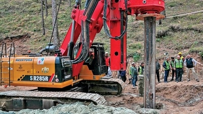 Vertical drilling machine in action at the Uttarakhand tunnel collapse site (AFP) (HT_PRINT) Vertical drilling machine in action at the Uttarakhand tunnel collapse site (AFP) (HT_PRINT)