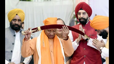 Chief Minister Yogi Adityanath offering prayers at Aashiyana Gurudwara on the occasion of Guru Nanak Jayanti, in Lucknow on Monday. (AGENCY) Chief Minister Yogi Adityanath offering prayers at Aashiyana Gurudwara on the occasion of Guru Nanak Jayanti, in Lucknow on Monday. (AGENCY)