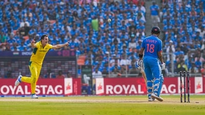 India's Virat Kohli is bowled out by Australia captain Pat Cummins in the World Cup final. (PTI) India's Virat Kohli is bowled out by Australia captain Pat Cummins in the World Cup final. (PTI)