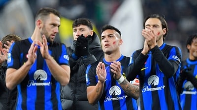 Inter Milan's Stefan de Vrij and Lautaro Martinez applaud fans after the match (REUTERS)