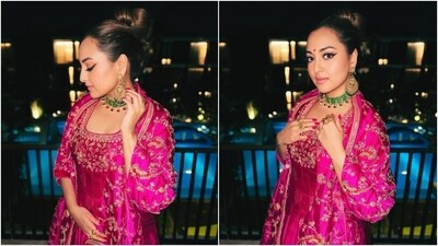 Sonakshi's second outfit is a Rani pink Punit Balana silk anarkali suit featuring a floor-length anarkali dress and a matching dupatta. The ensemble comes embroidered in gold thread embroidery in floral patterns. Tassel adornments on the dupatta and a square neckline on the kurta added definition to the ensemble. (Instagram) Sonakshi's second outfit is a Rani pink Punit Balana silk anarkali suit featuring a floor-length anarkali dress and a matching dupatta. The ensemble comes embroidered in gold thread embroidery in floral patterns. Tassel adornments on the dupatta and a square neckline on the kurta added definition to the ensemble. (Instagram)