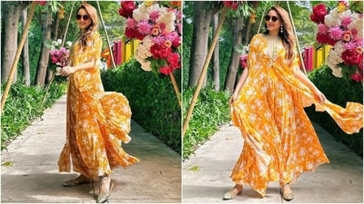 The last outfit Sonakshi Sinha wore is from the shelves of designer Arpita Mehta's eponymous label. She wore a yellow-coloured cape kurta and palazzo pants set adorned in pretty white floral patterns, ruffled borders, and gold taar and mirror work on the neckline. (Instagram) The last outfit Sonakshi Sinha wore is from the shelves of designer Arpita Mehta's eponymous label. She wore a yellow-coloured cape kurta and palazzo pants set adorned in pretty white floral patterns, ruffled borders, and gold taar and mirror work on the neckline. (Instagram)
