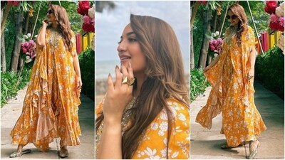 Sonakshi accessorised the ensemble with statement gold rings, mirror-adorned juttis, and sunglasses. Meanwhile, side-parted open wavy locks, dangling earrings, a dainty nath, minimal makeup, and kohl-lined eyes rounded off the glam. (Instagram) Sonakshi accessorised the ensemble with statement gold rings, mirror-adorned juttis, and sunglasses. Meanwhile, side-parted open wavy locks, dangling earrings, a dainty nath, minimal makeup, and kohl-lined eyes rounded off the glam. (Instagram)