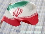 Iran's sports minister has sacked the country's deaf sports federation chief after pictures emerged of a foreign woman athlete without a compulsory headscarf at a tournament, local media said.
