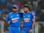 Indian bowler Mukesh Kumar celebrates with captain Suryakumar Yadav after taking wicket of Australia's batter Marcus Stoinis during the second T20 International cricket match of a T20I series between India and Australia Indian bowler Mukesh Kumar celebrates with captain Suryakumar Yadav after taking wicket of Australia's batter Marcus Stoinis during the second T20 International cricket match of a T20I series between India and Australia