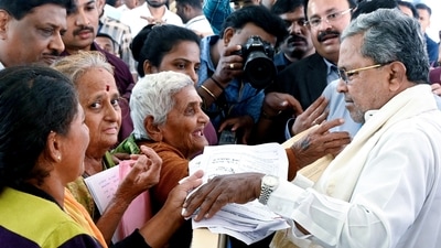 Karnataka Chief Minister Siddaramaiah receives complaints from the public during a day-long Janata Darshan at CM's residential office Krishna, in Bengaluru on Monday. (ANI Photo) (Shashidhar Byrappa) Karnataka Chief Minister Siddaramaiah receives complaints from the public during a day-long Janata Darshan at CM's residential office Krishna, in Bengaluru on Monday. (ANI Photo) (Shashidhar Byrappa)